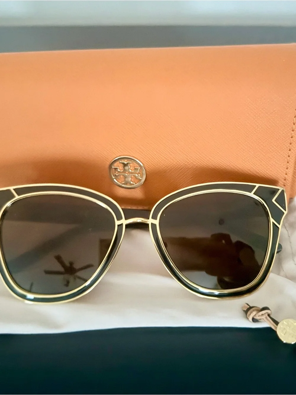 Tory Burch Black and Gold Rounded Cat-Eye Sunglasses